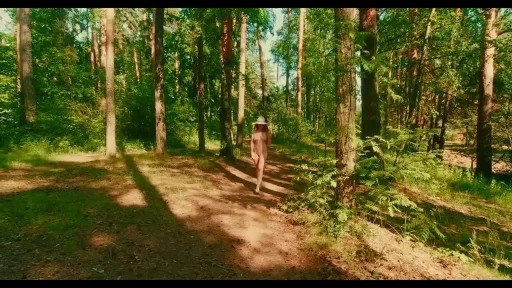 Nudist girl walking naked through the forest and shows her body to some strangers Porn Videos | ePornFap.