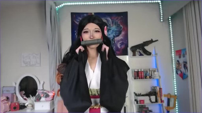 Cute brunette cosplaying Nezuko Kamado and masturbating her sweet pussy