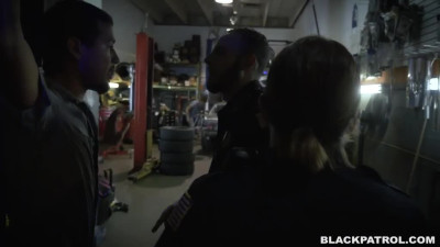 Two white police whores ride a big black cock in a chop shop