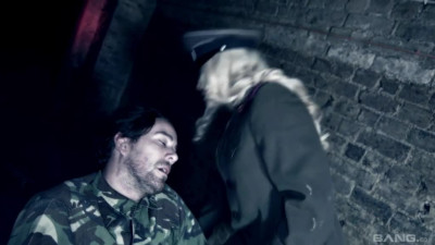 Nasty secret police officer Jordan Jagger interrogates a soldier