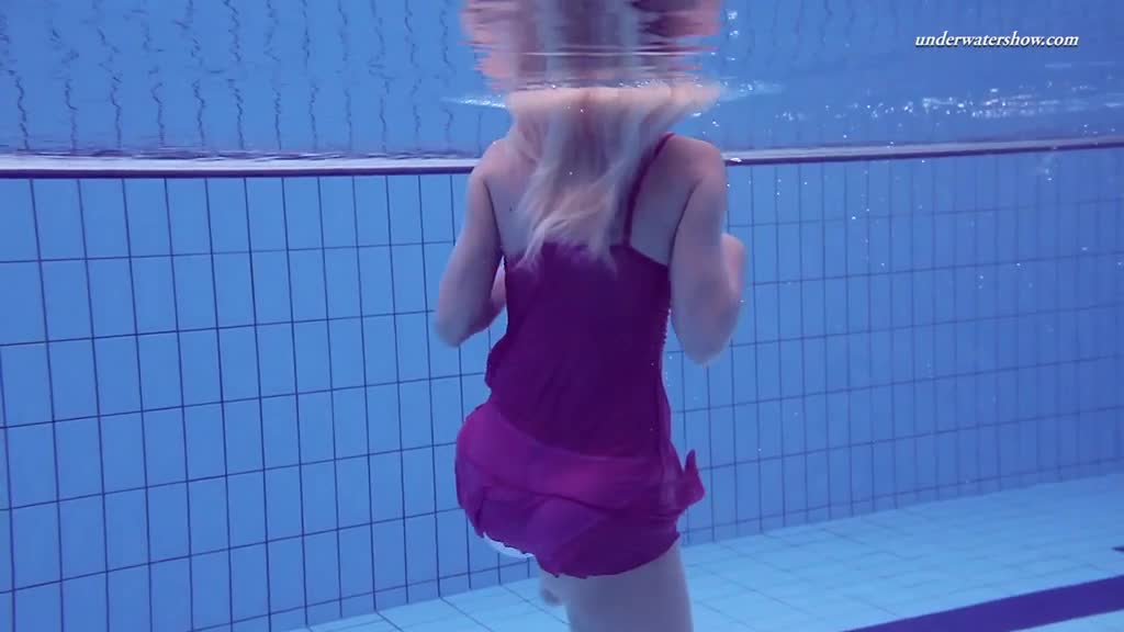 Playful blonde girl swims naked in Olympic swimming pool Porn Videos | ePornFap.