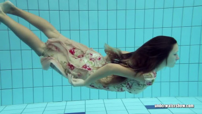 Lucy takes the dress off showing her hairy pussy and titties underwater