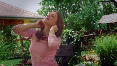 Bewitching Russian teen Alessandra Jane teases her pussy in a garden