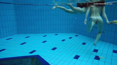 Euro babes Liza and Alla take their nice dresses underwater